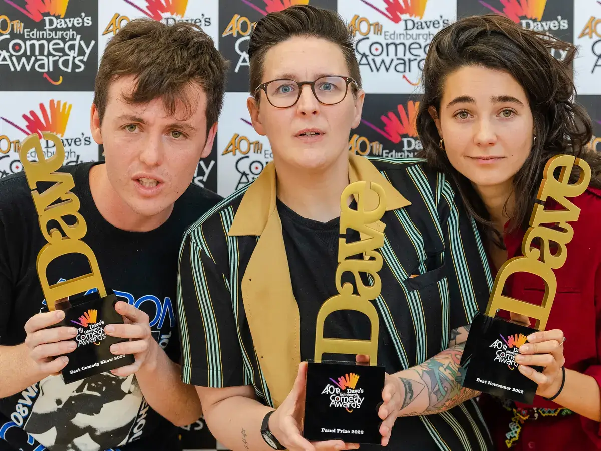 Big Belly Comedy Club London Three people posing with their awards at the australian comedy awards.