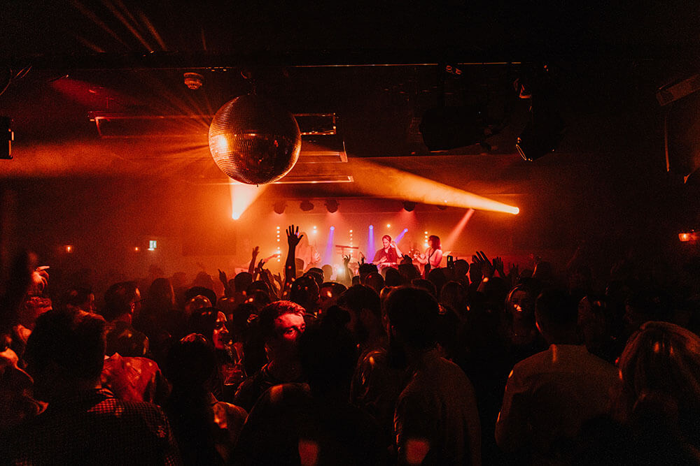 A crowd of people at a nightclub.
