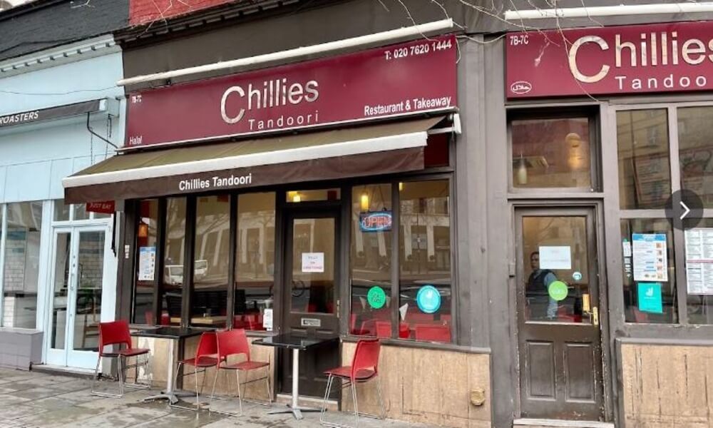 Chillie's restaurant on the corner of a street.