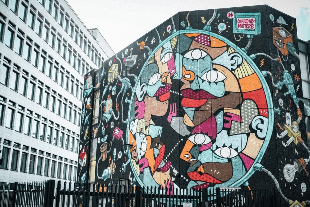 A colorful mural on the side of a building.
