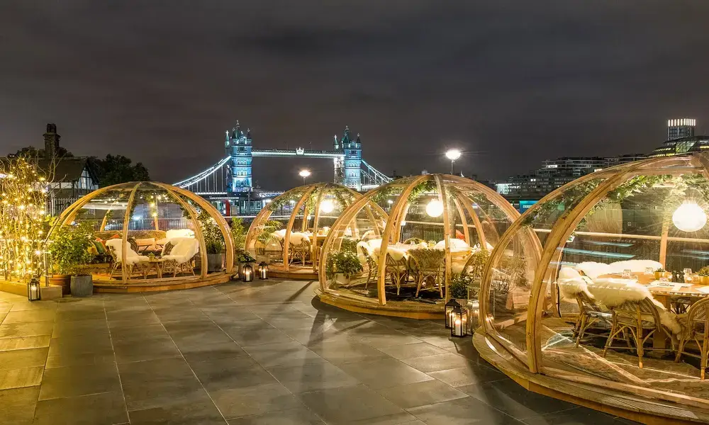 London's tower bridge at night in glass domes.