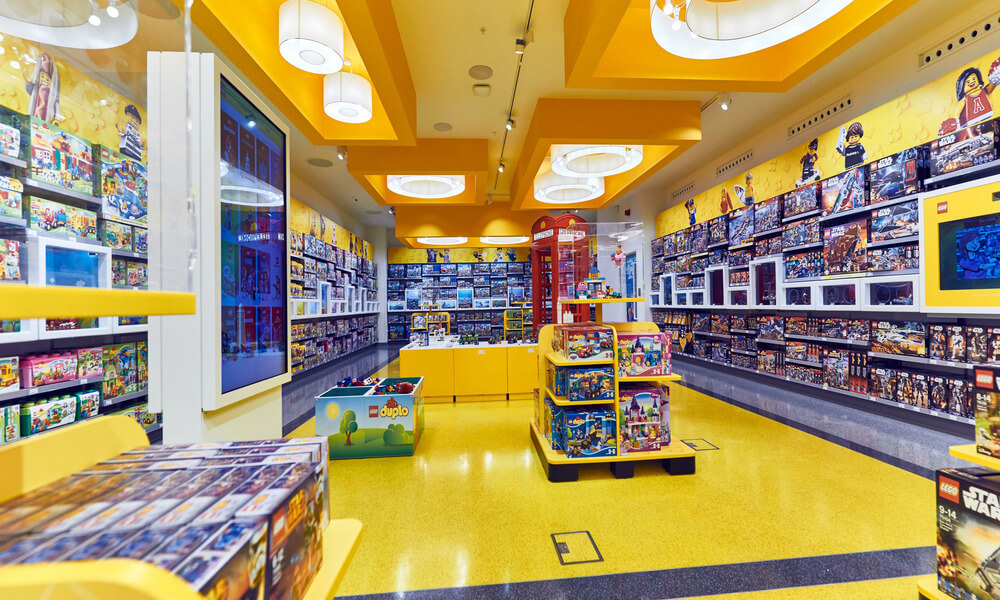 A yellow floor in a toy store.