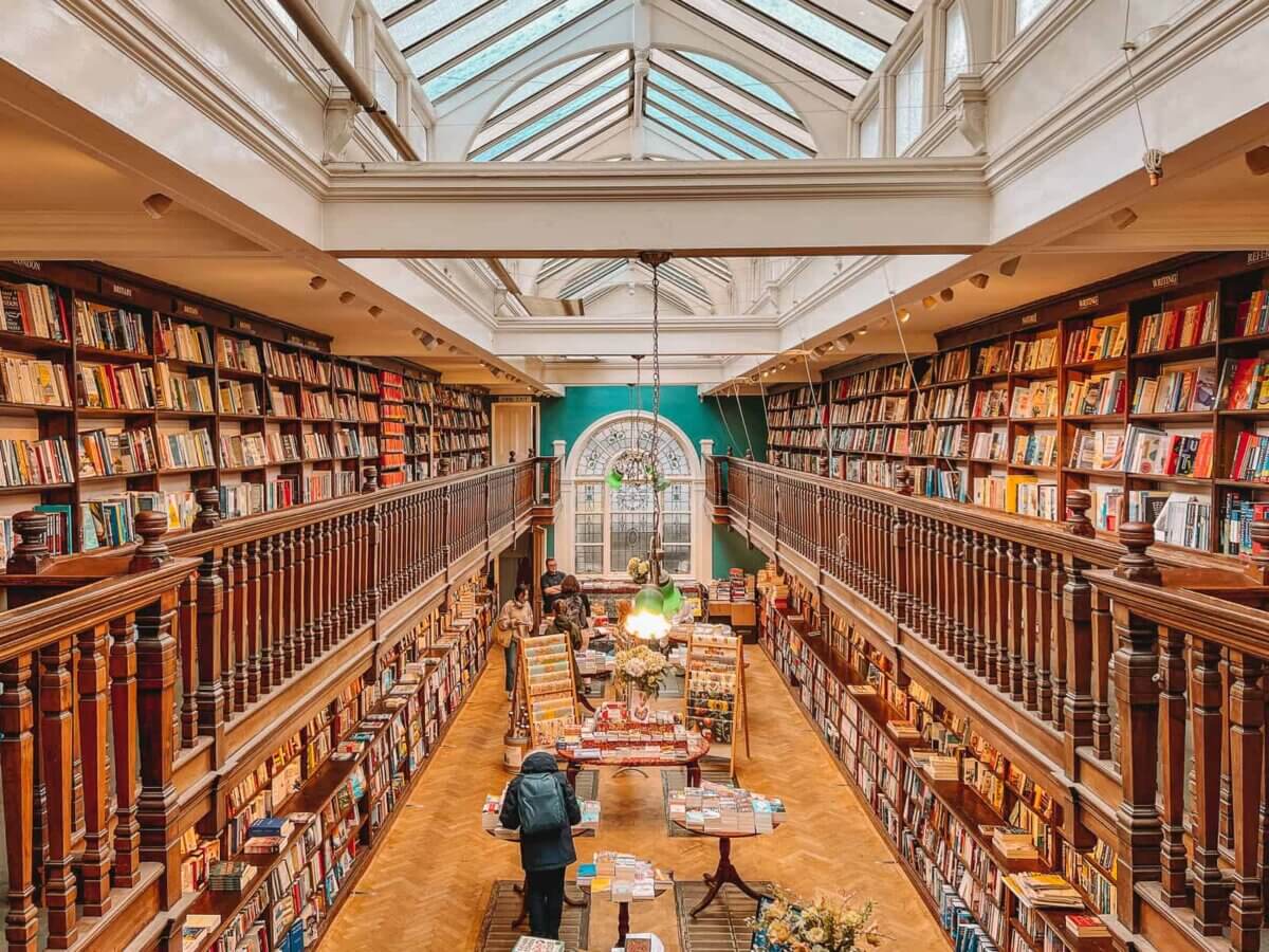 The inside of a book store with lots of books.