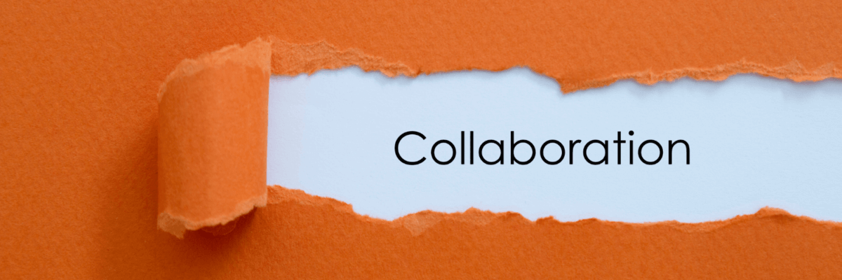 A torn piece of paper with the word collaboration on it.